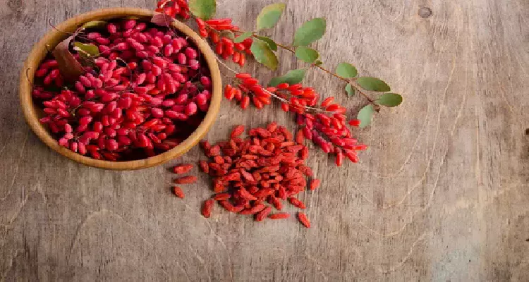 Bright red goji berries in a bowl, supporting eye and immune system health for clear vision