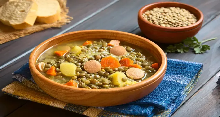 A bowl of lentil soup for a high-fiber diet to prevent constipation