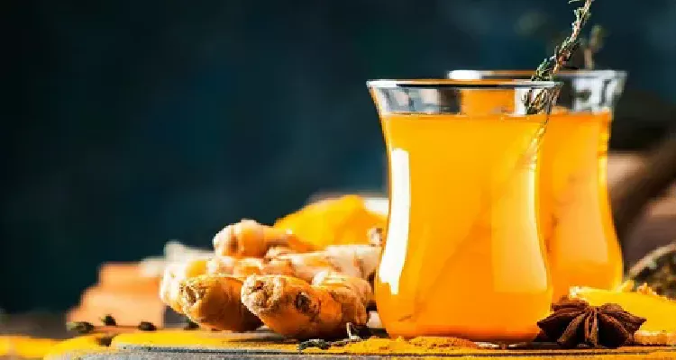 Senior enjoying turmeric tea, a natural product to strengthen elderly immunity