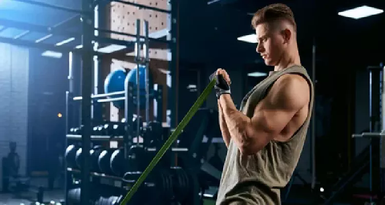 Man performing pull-ups as a natural exercise for male muscle strengthening with a resistance band
