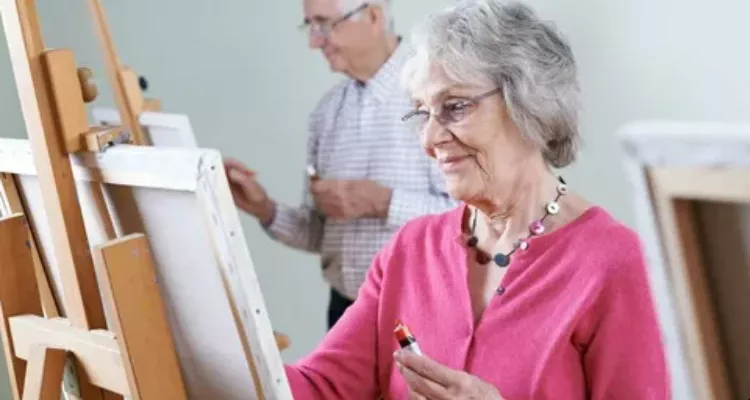 Senior practicing gratitude journaling for mental and cognitive health